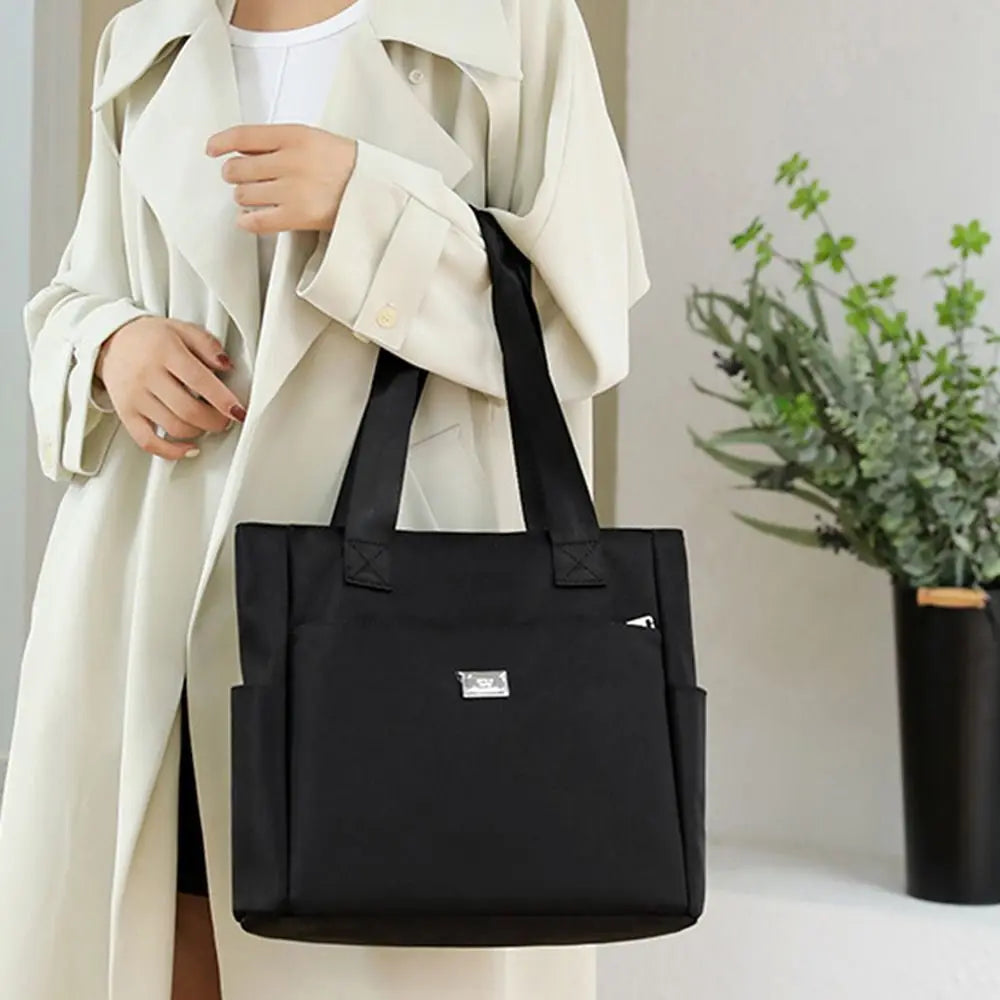 Cassandra® | Bolso bandolera impermeable de gran capacidad